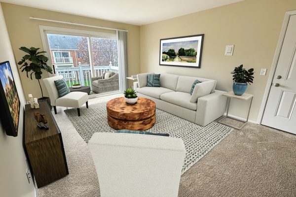 Modern living room with neutral sofa, wooden coffee table, and large window overlooking balcony. Bright, cozy interior.