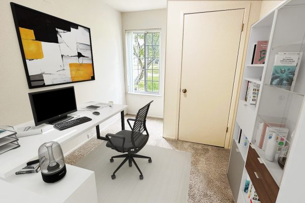 Modern home office with computer desk, ergonomic chair, bookshelf, and abstract wall art beside a sunny window.